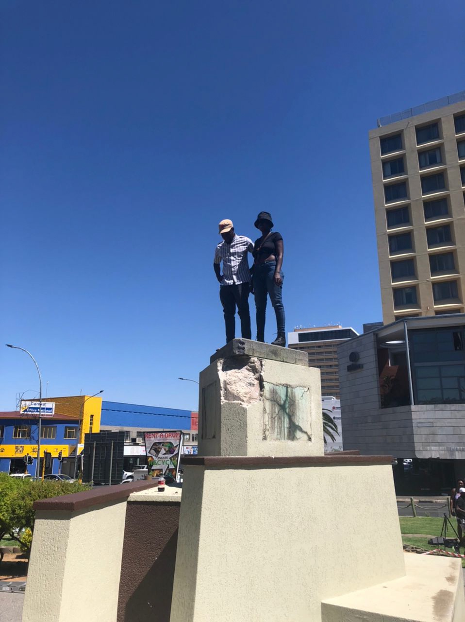 Job Shipululo Amupanda on empty Curt von François statue on Nov 23, 2022 / FORUM | CC BY-SA 4.0